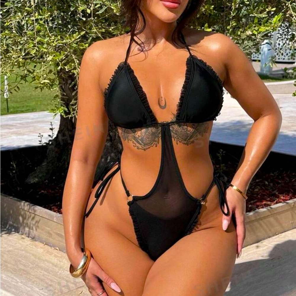 Black swimsuit with cut outs